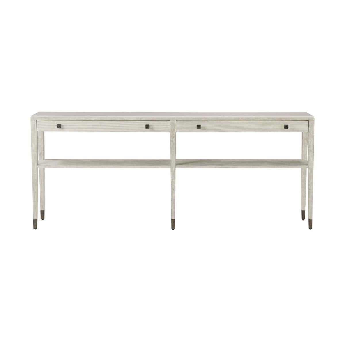 Coastal long console table with a white limestone top, wire-brushed cerused pine in our Sea Salt finish with two long drawers accented with four organic ribbed metal knobs in our dark sterling finish and a lower display shelf.

Dimensions: 84