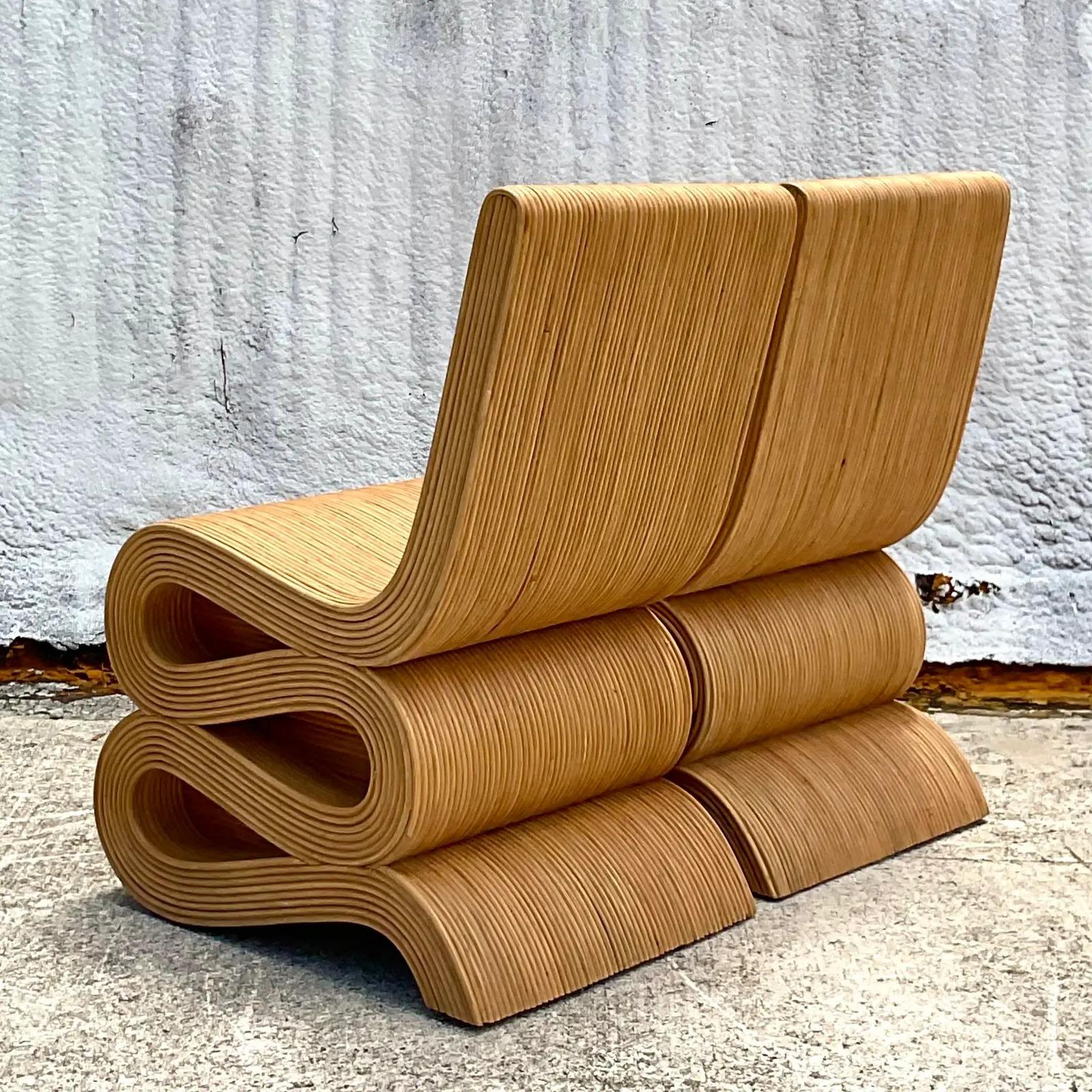 20th Century Coastal Pencil Reed Wiggle Chairs, a Pair