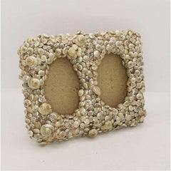 Marco de fotos de arte popular de conchas brillantes costeras