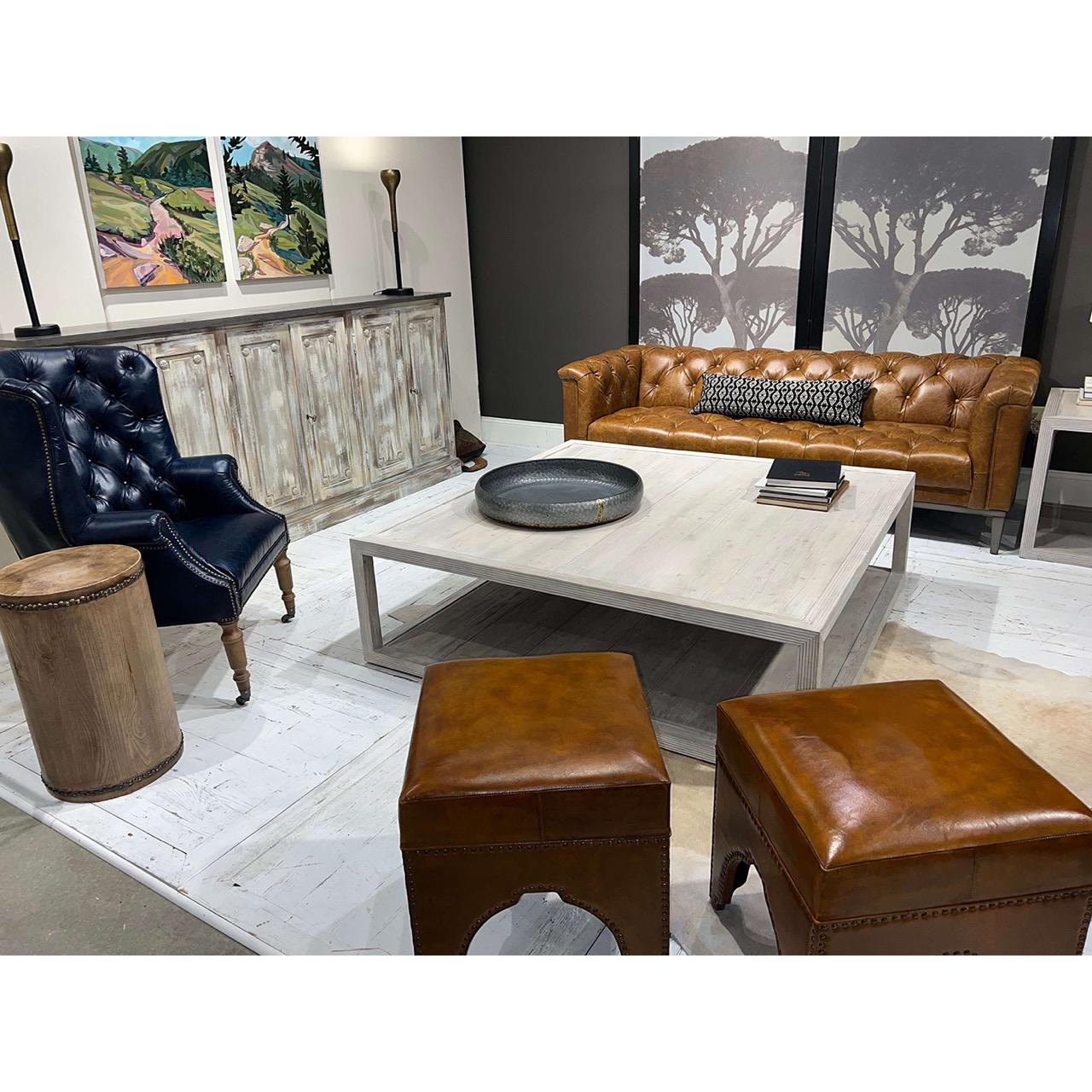 Coffee table brings refined simplicity and relaxed sophistication to any living space. Crafted in pine and finished in a soft Grey Thorne, this table showcases a clean-lined, open-frame design that emphasizes symmetry and balance. The weathered