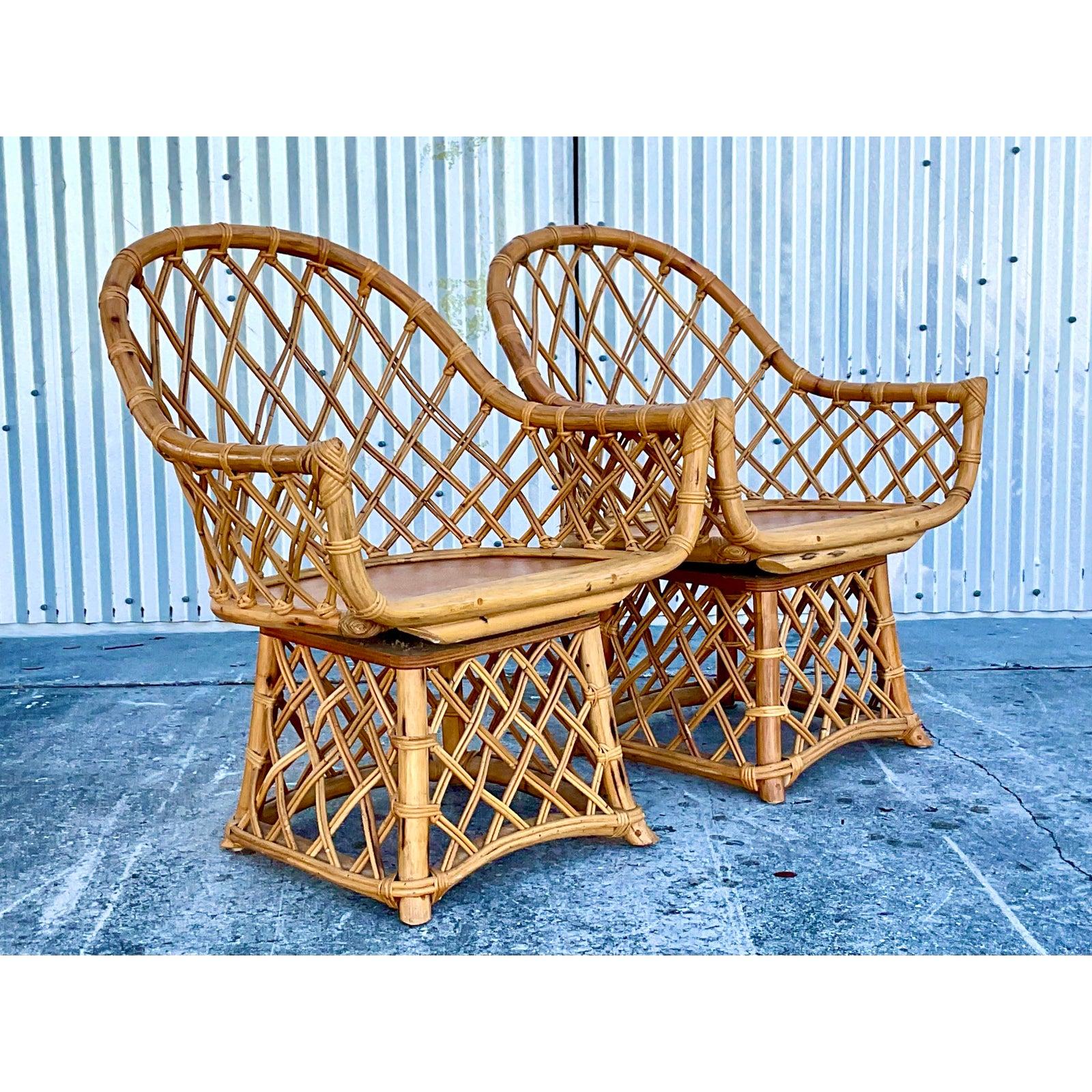 North American Coastal Willow and Reed Fretwook Rattan Swivel Chairs, a Pair