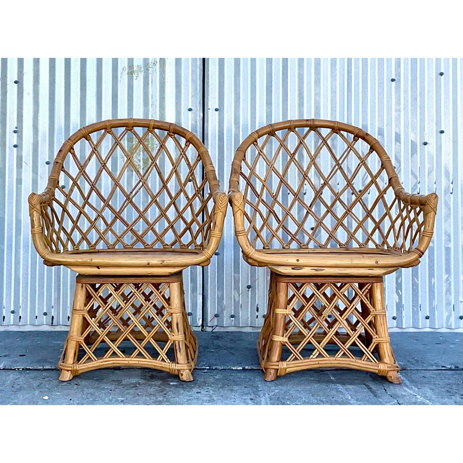 Coastal Willow and Reed Fretwook Rattan Swivel Chairs, a Pair 1