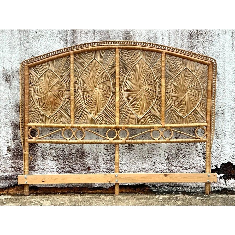 This vintage coastal woven rattan king headboard brings effortless beachside charm and natural texture to your bedroom. Expertly crafted with intricate woven patterns, it showcases the timeless appeal of rattan with a sturdy yet lightweight design.