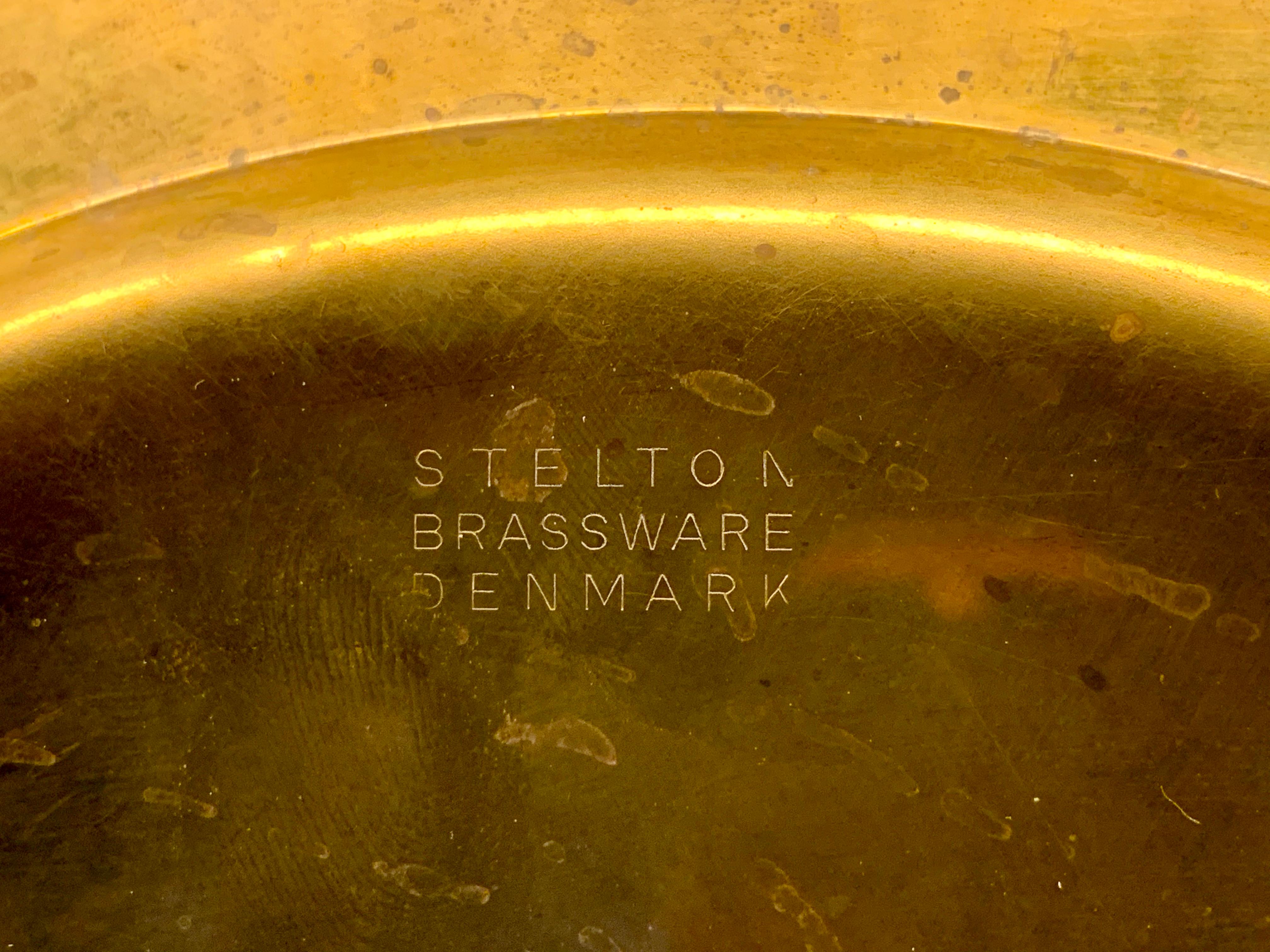 Set of ten coaster dining brass plates produced in mid-Century by Stelton in Denmark.
