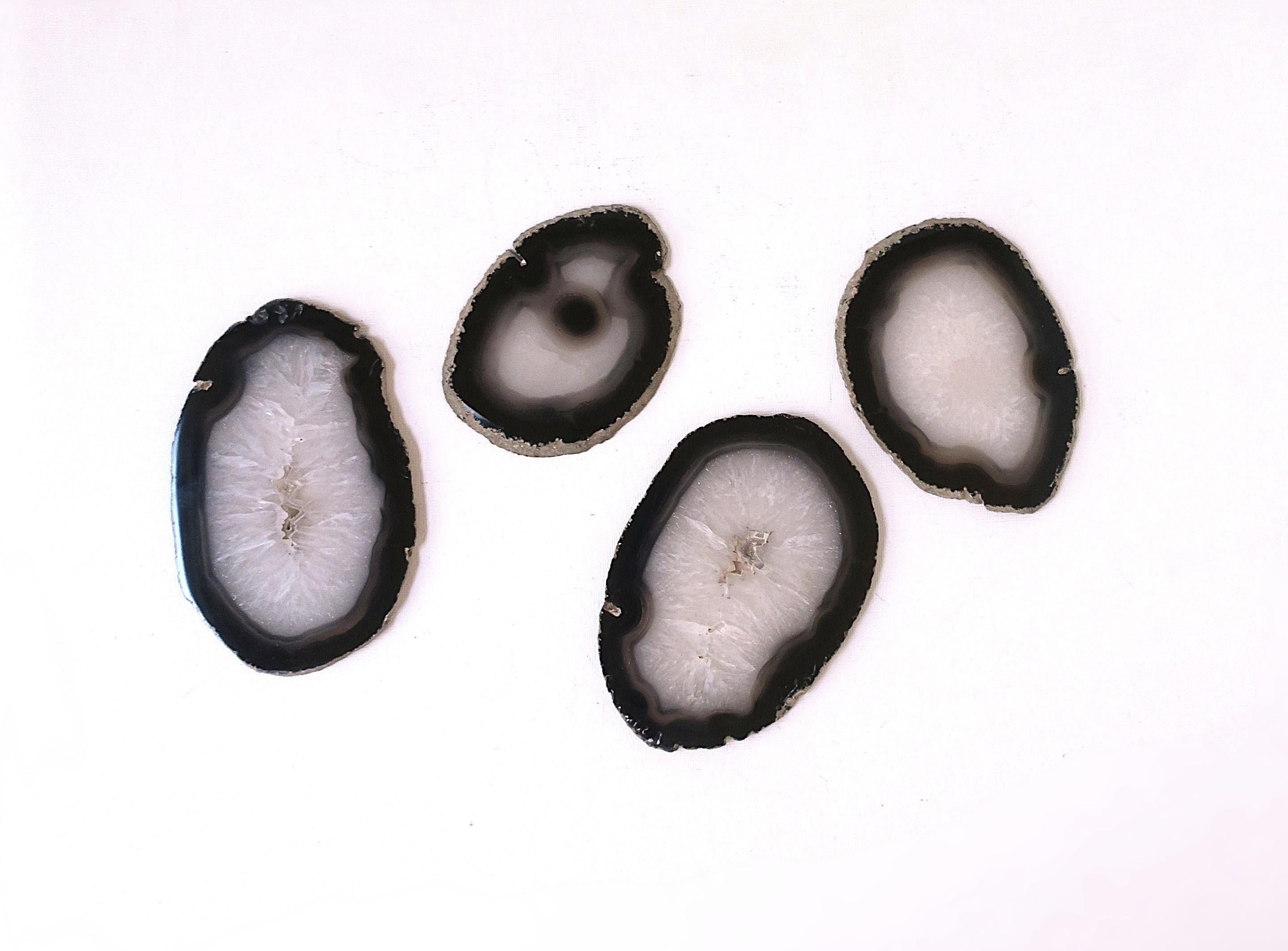 A chic set of four (4) black and white agate cocktail, Champagne, or any drink coasters. A great addition to any bar, bar cart, or entertaining area, etc. And a necessity for protecting furniture tops.
