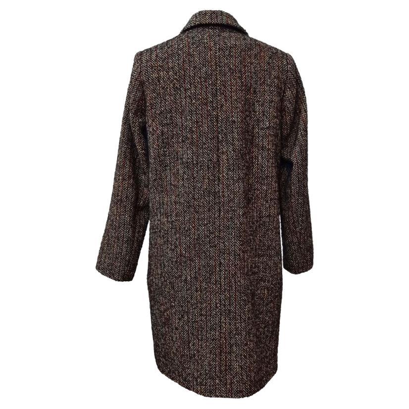 Wool (50%) Polyester (19%) Acrylic (16%) Polyamid (7%) Alpaca (5%) Other fibers (3%) Multicolor Long sleeves Two pockets One button closure Shoulder length / hem cm 88 (3464 inches) Shoulder cm 36 (1417 inches) French size 34 international size S
