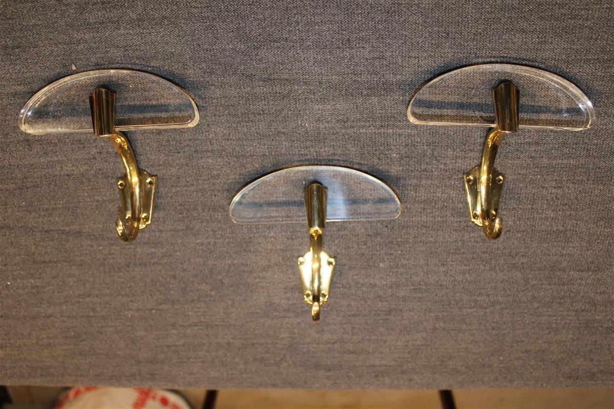 Coat hangers in lucite and solid brass Italian 1950s mid century design, elegant and of great design.