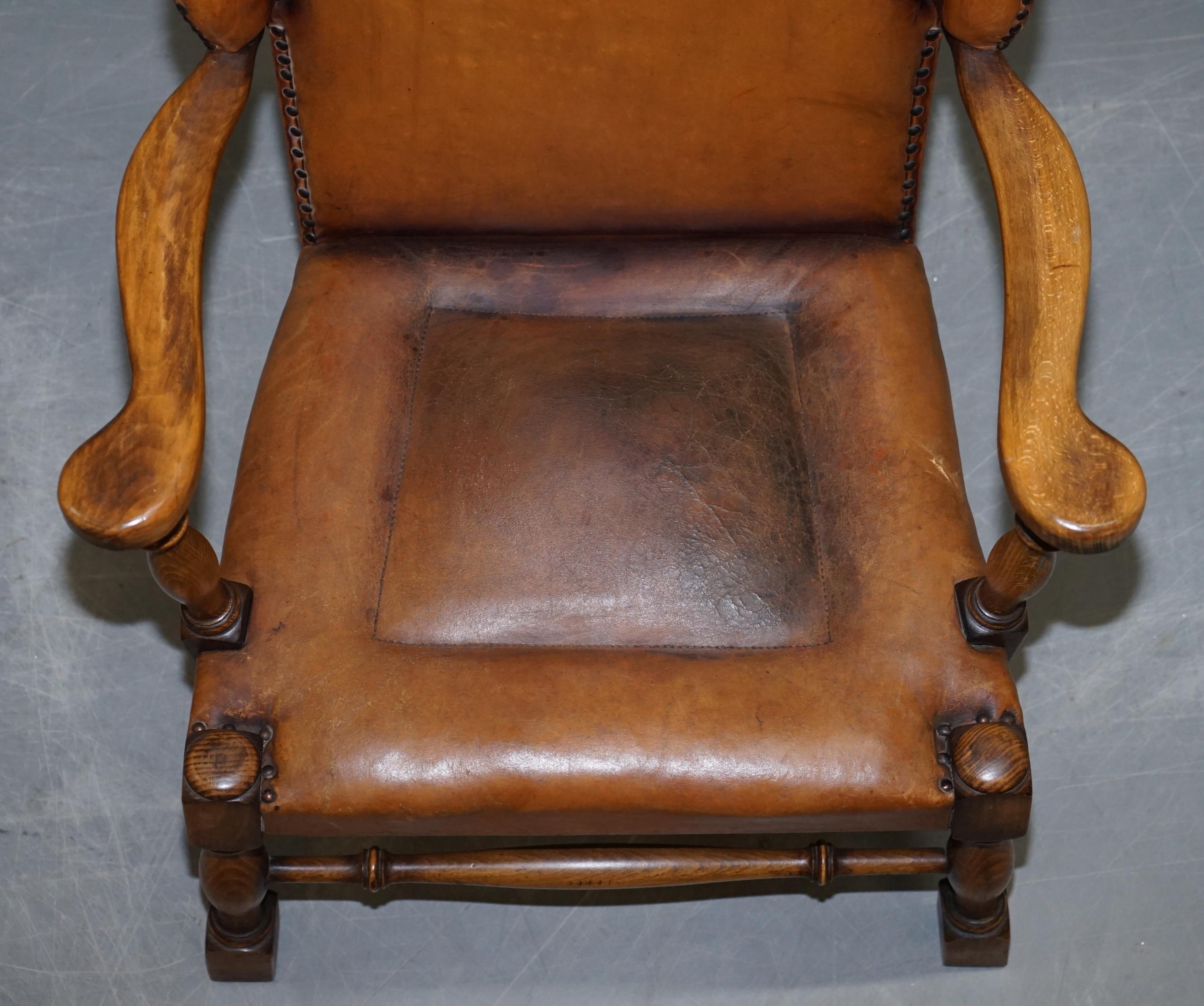 20th Century Coat of Arms Armorial Crest Edwardian Oak and Brown Leather Wingback Armchairs