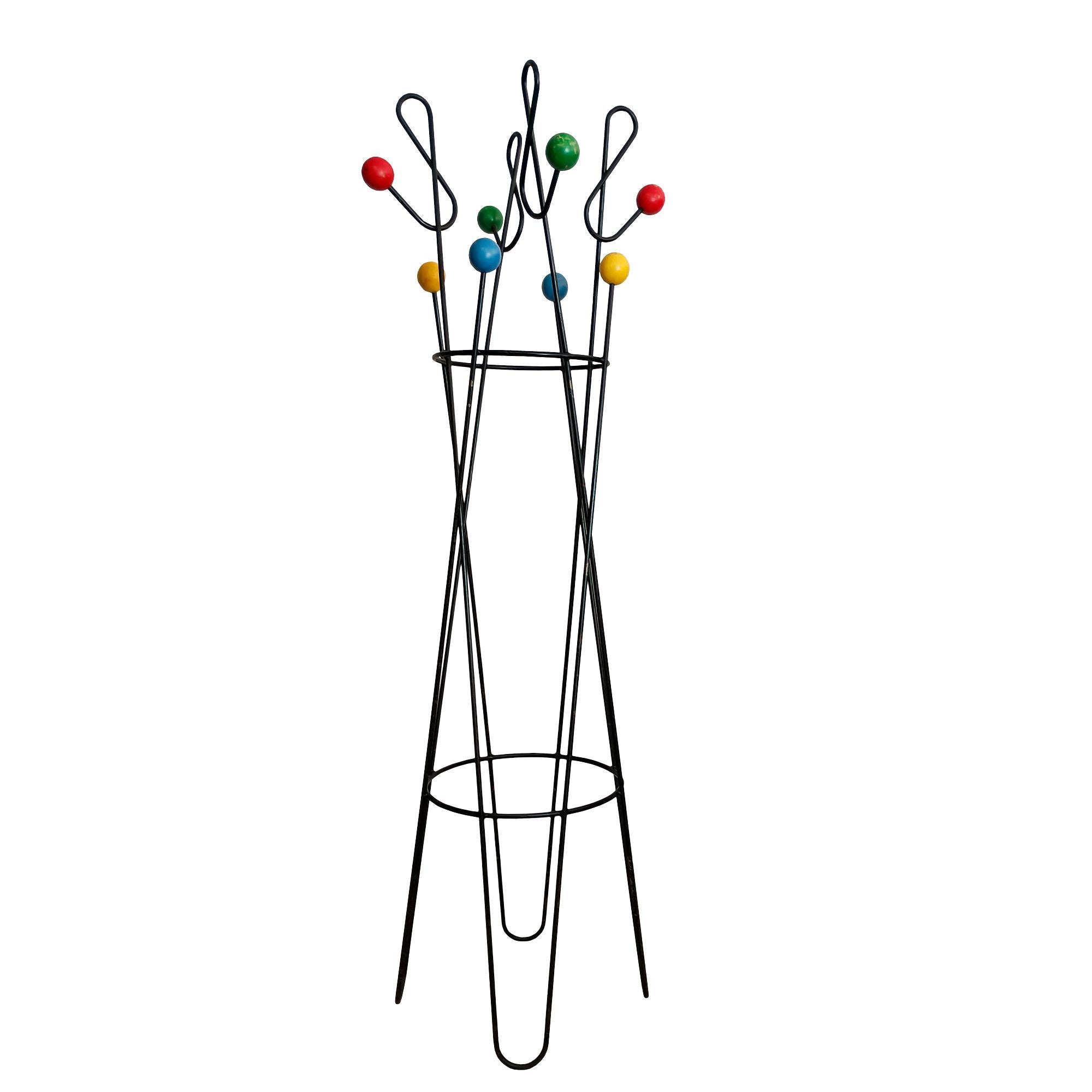 Large coat rack in blackened solid steel tubes and wood balls painted in four colours.
Design: Roger Feraud

France c. 1950