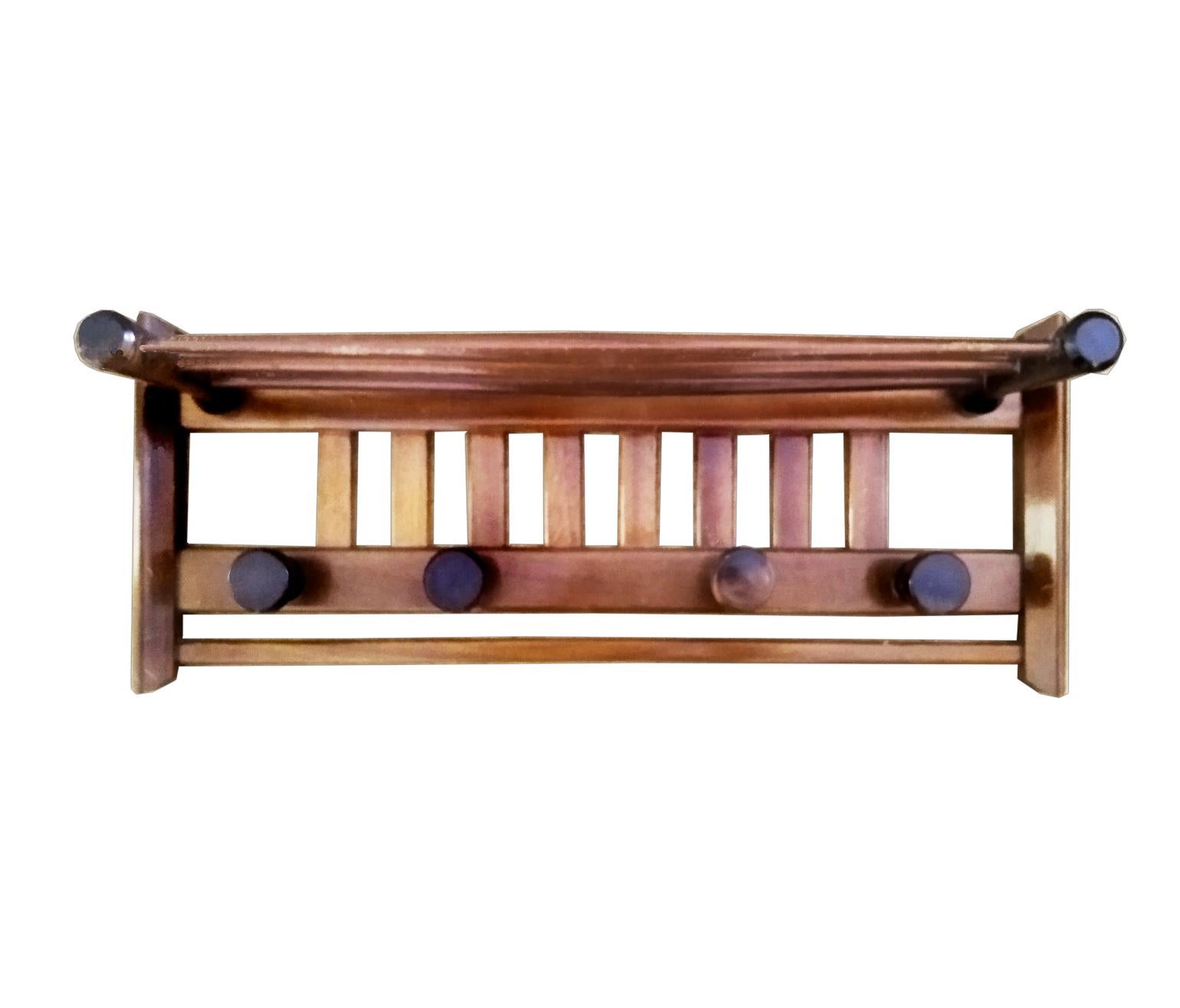 Large Wood coat rack from the mid 20th century
Excellent conditions

Perfect for entering your home to hang your bags coats
It has a top shelf to support the hats

Elegant and functional coat rack.

