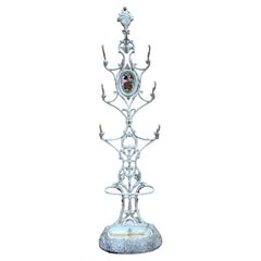 Coat rack in cast iron Art Nouveau period – with original tray