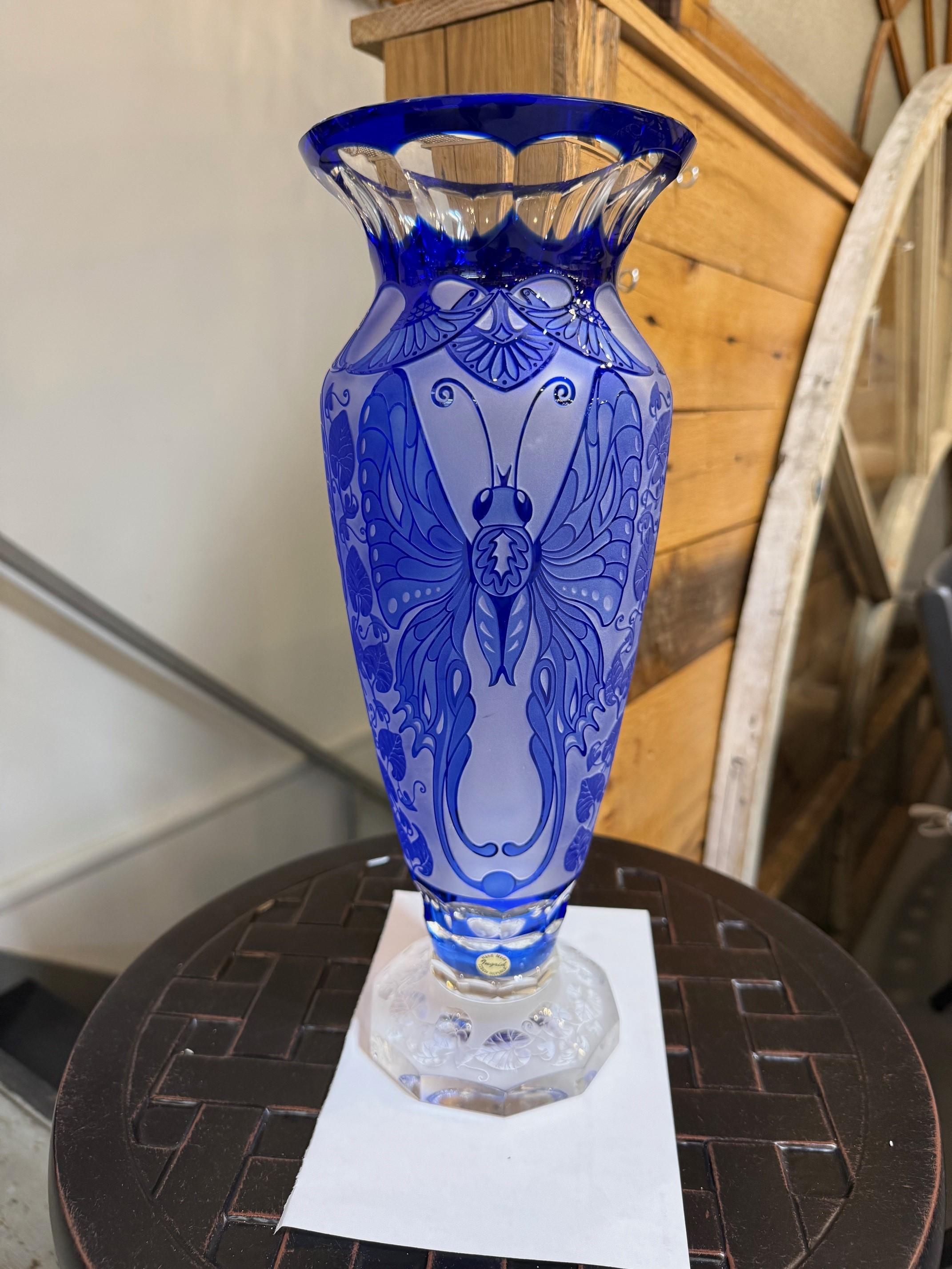 Stunning hand cut cobalt blue lead crystal butterfly vase created as a work of art by the hands of the finest Czech glass workers. Its not signed but does have a sticker Ingrid hand made Czech Republic. This vase was imported to the United States