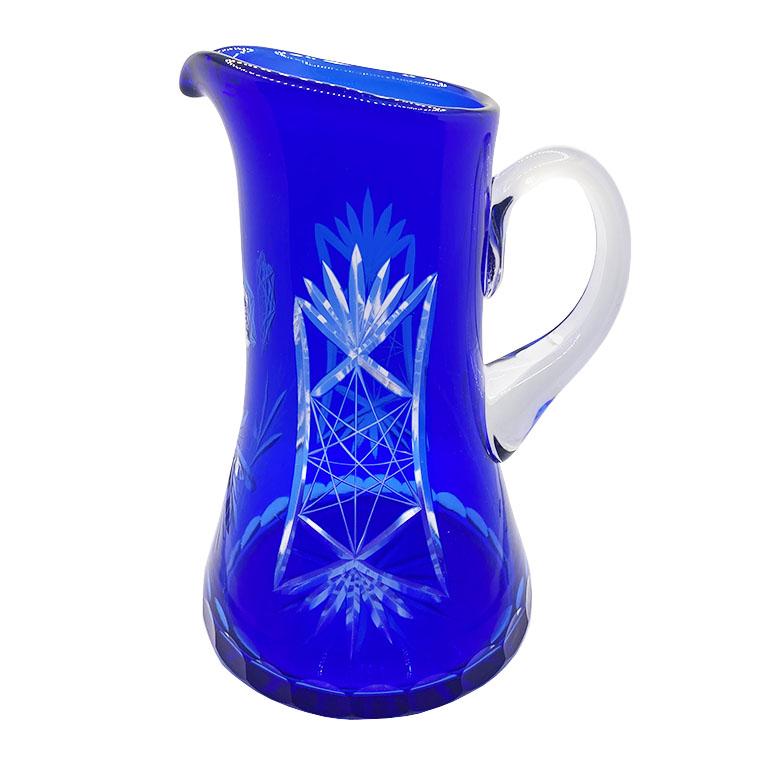 crystal pitcher and glasses