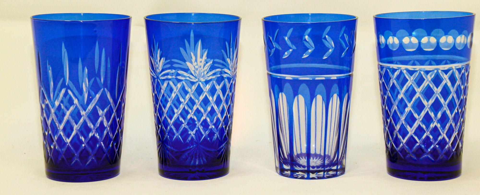 Set of eleven hand made cobalt blue cut to clear crystal drinking rock glasses tumblers highball barware in Baccarat style.
Fabulous Baccarat French style vintage cobalt blue tumblers drinking glasses in beautiful color of deep cobalt blue and