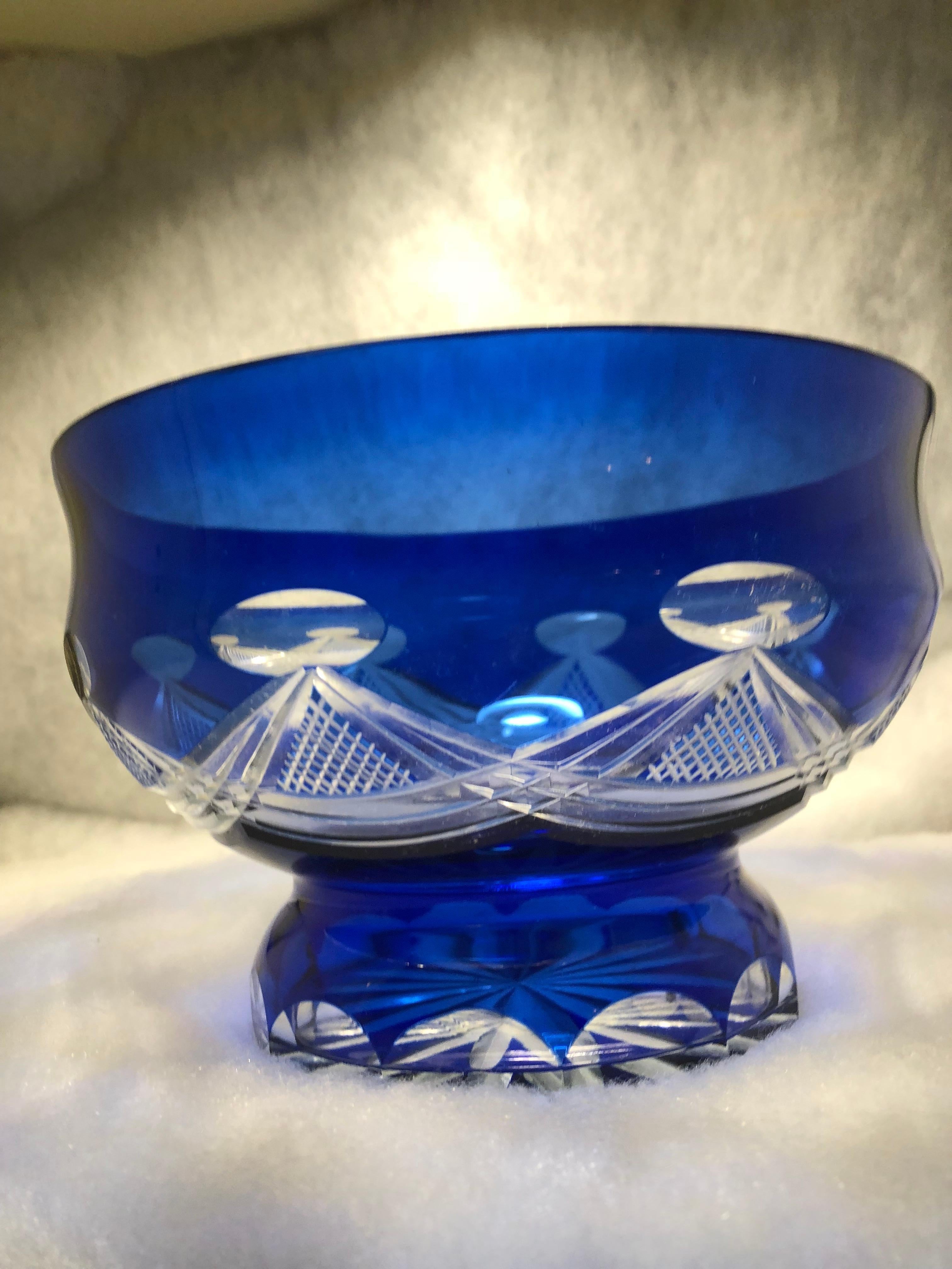Cobalt blue glass bowl cut to clear. Very pretty pattern. No chips cracks or scratches.