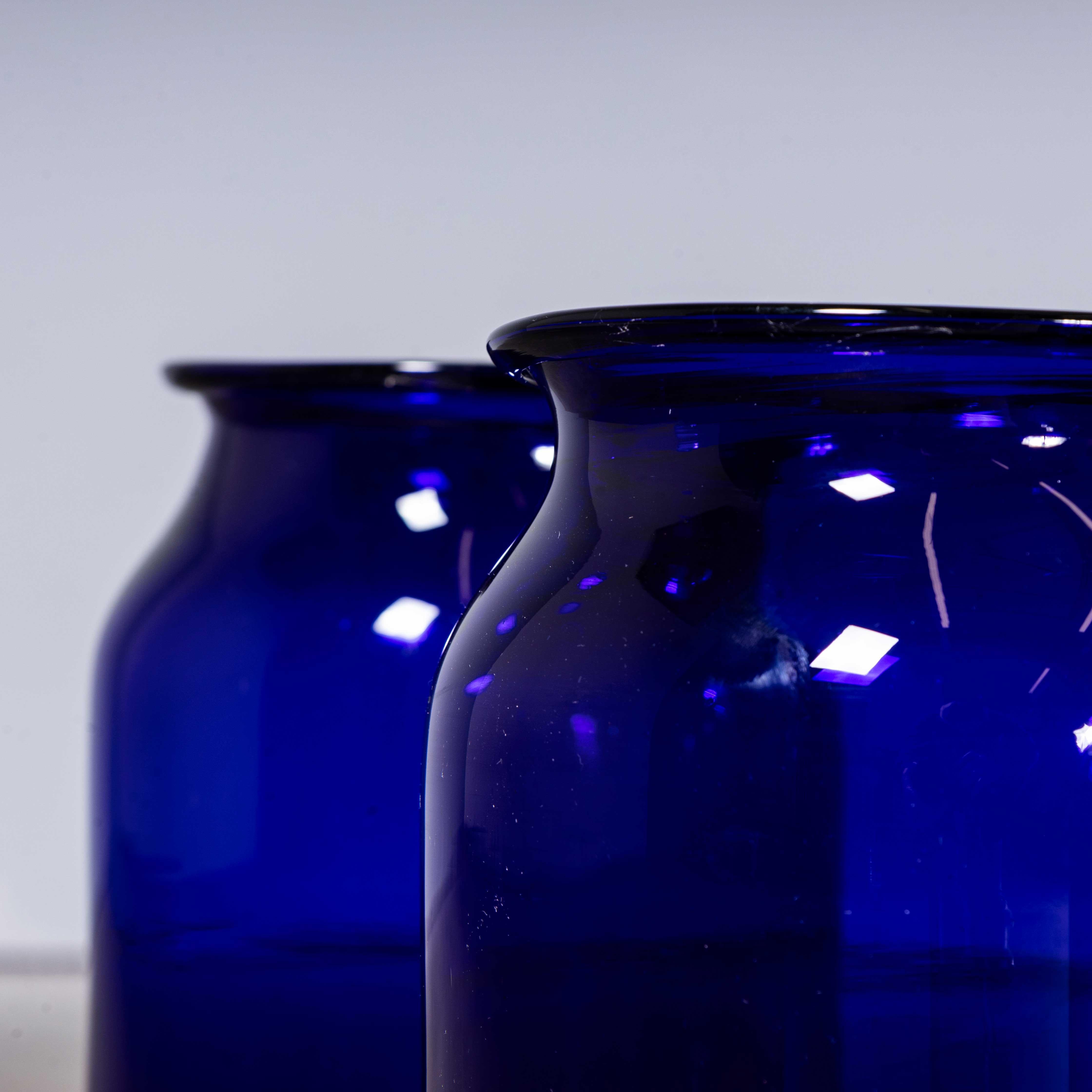 Cobalt Blue Glass Jar – Tall Vase – Mouth Blown
Cobalt Blue Glass Jar – Tall Vase – Mouth Blown. These are contemporary vases made for us in Hungary. They are heavy thick glass mouth blown with hand rolled tops in the most beautiful rich cobalt