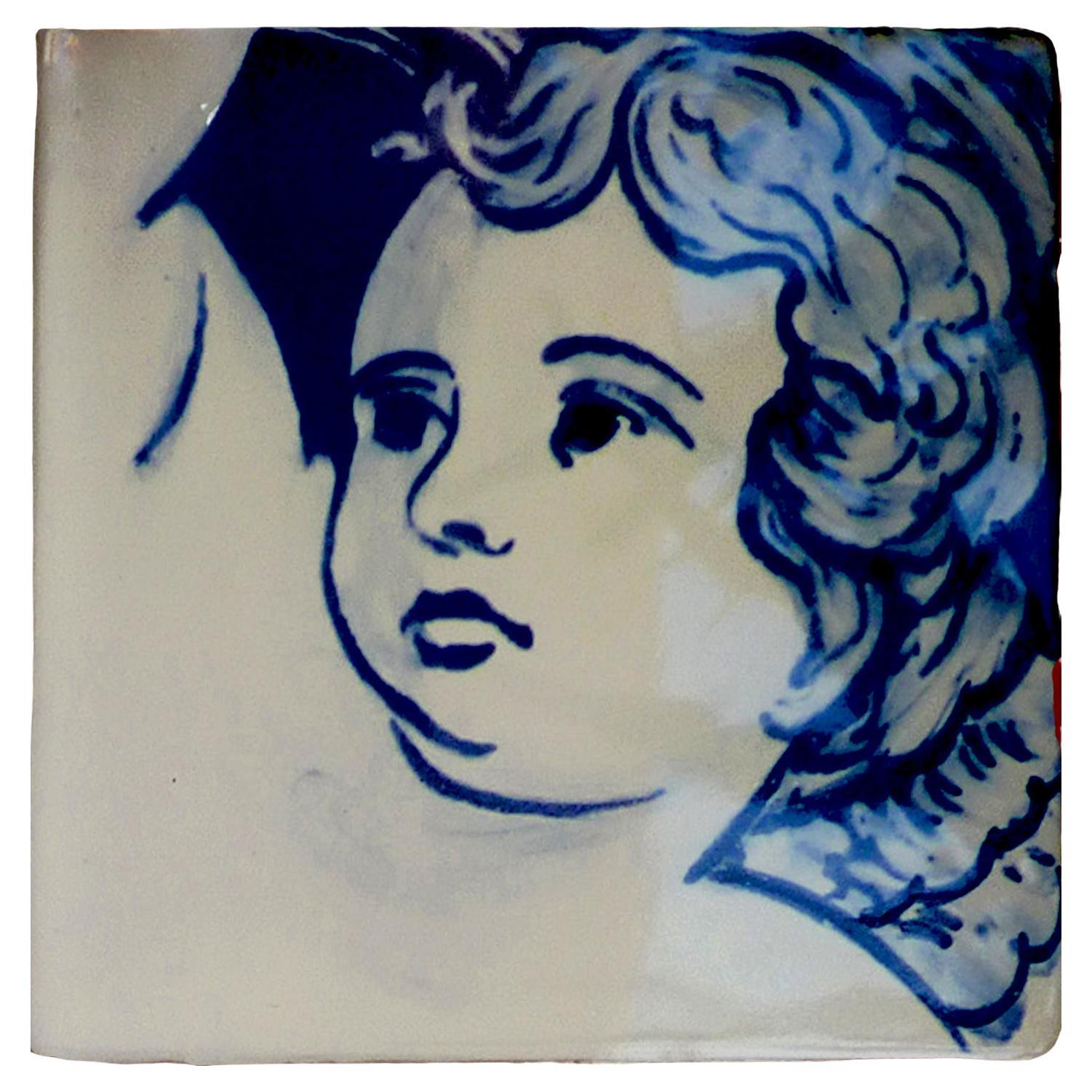 Tile en céramique portugaise Azulejo représentant un chérubin ou un ange, peint à la main, bleu cobalt en vente
