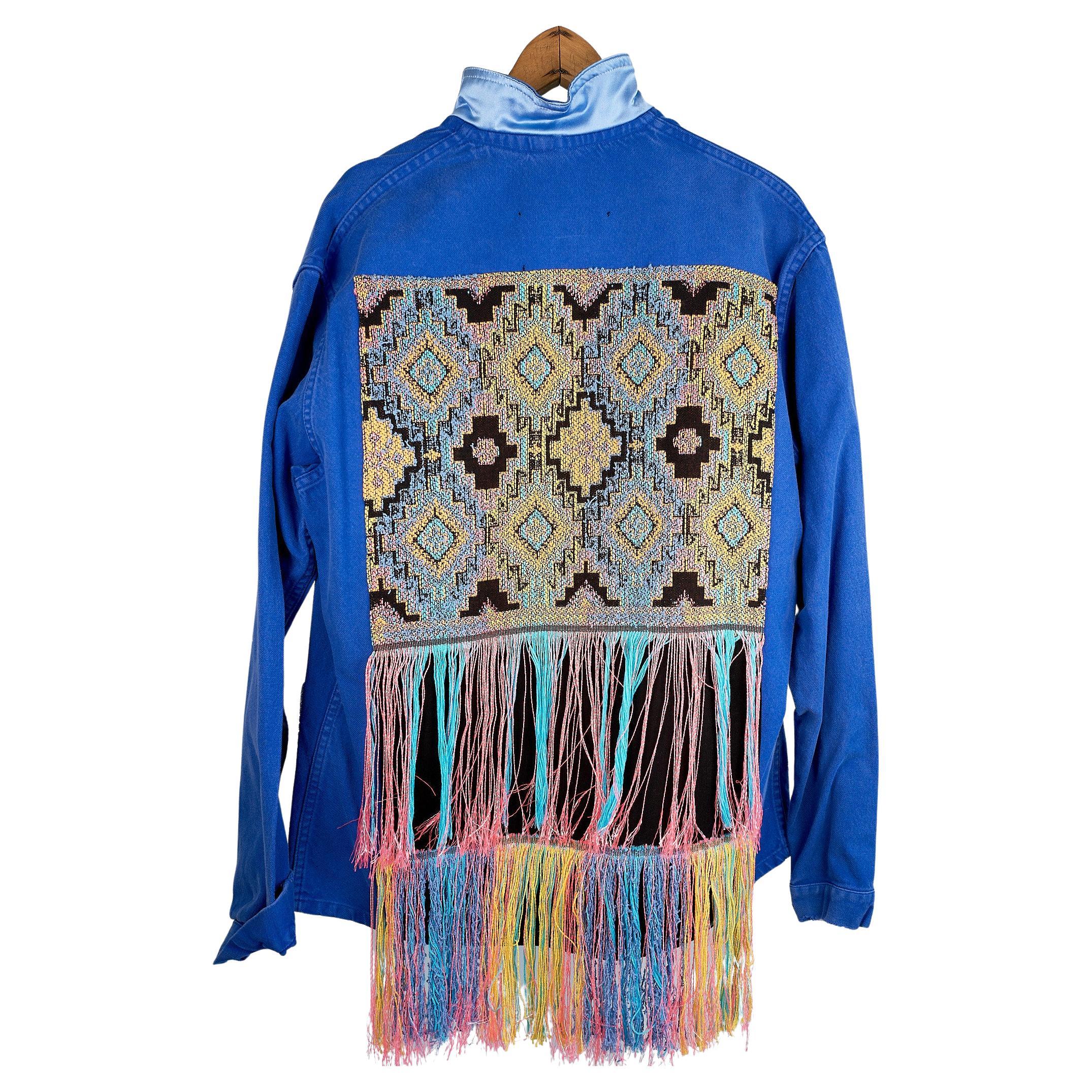 Multi Color Pattern Fringes Embellished Repurposed Cobalt Blue Jacket French Work Wear with a Light Blue Silk Collar and Light Blue Glitter

Brand: J Dauphin
Size: Large
100% Sustainable Luxury, Up-cycled and Re-purposed Collectible Vintage

Our