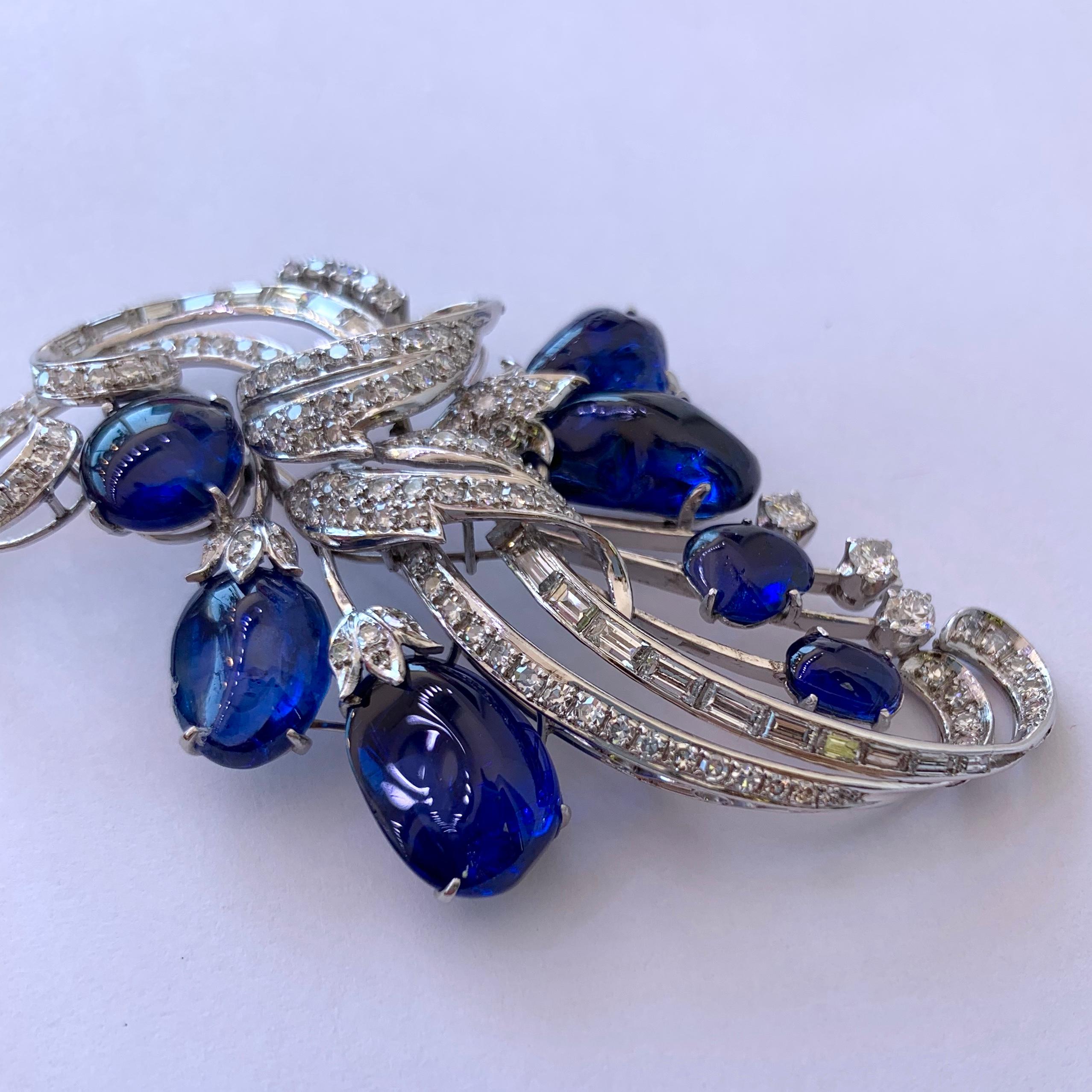 Round Cut Vintage Vibrant Blue Sapphire and Diamond Platinum Brooch For Sale