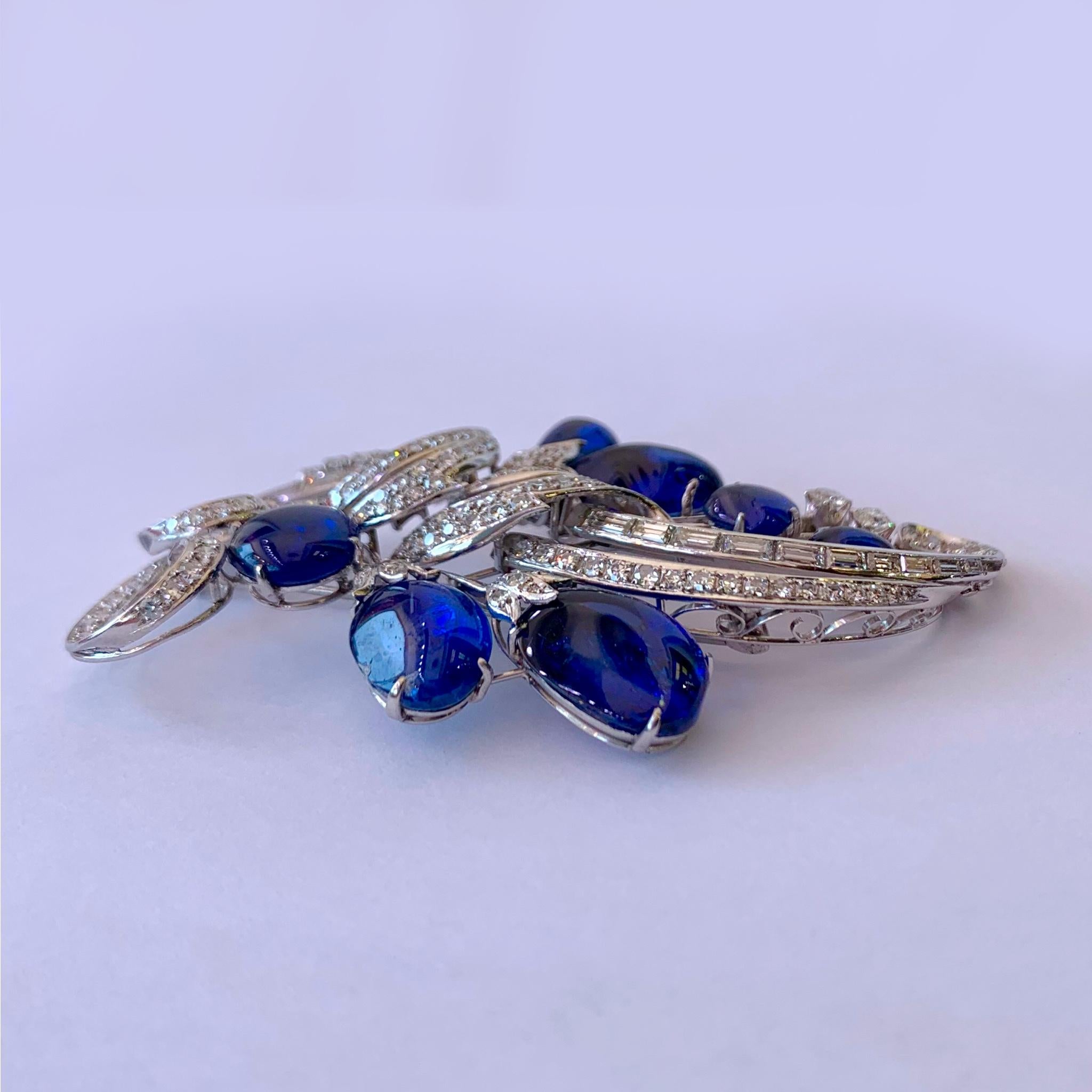 Women's or Men's Vintage Vibrant Blue Sapphire and Diamond Platinum Brooch For Sale
