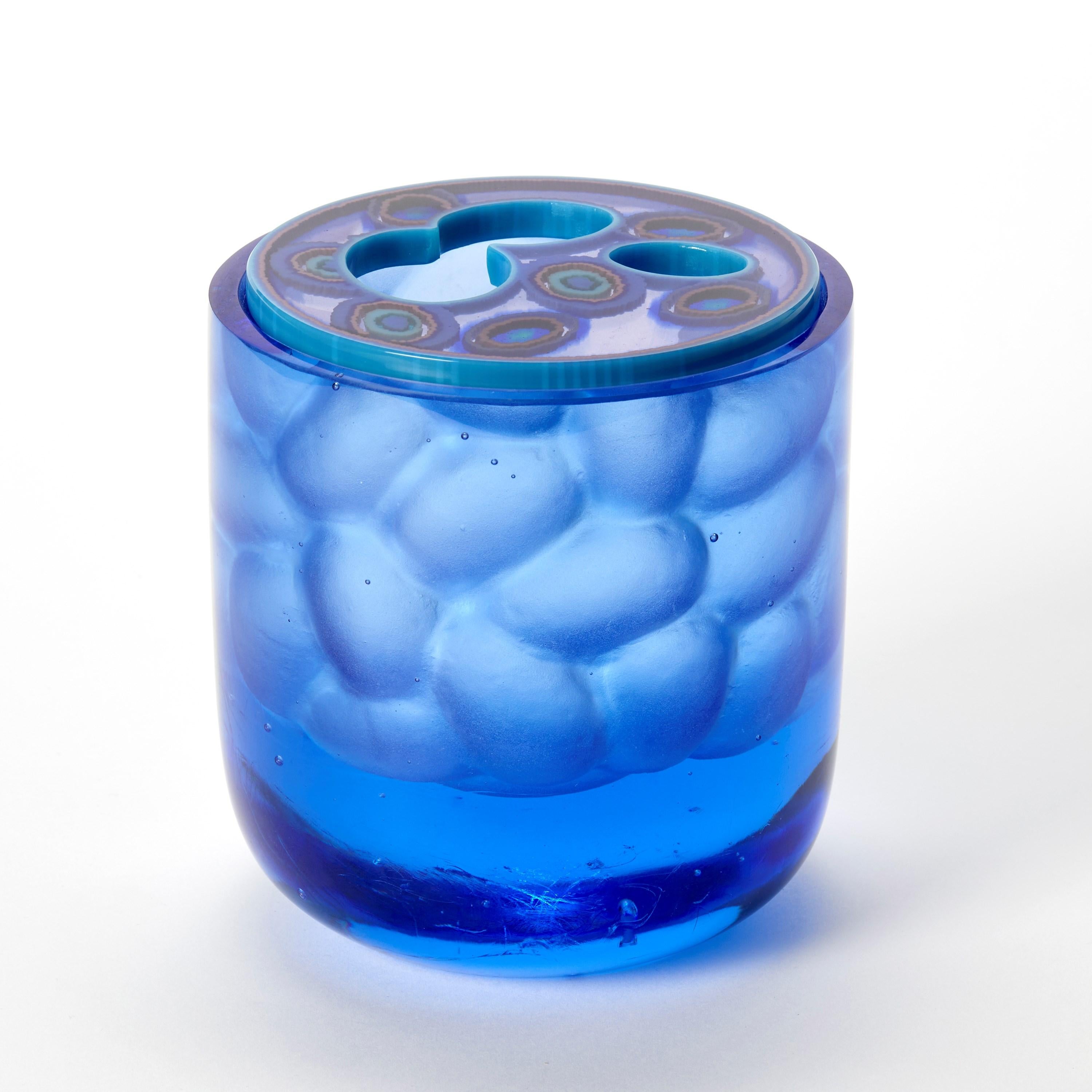 'Cobalt Cambium Jar' is a unique lost wax cast glass sculptural vessel by the British artist, Angela Jarman.  

Jarman is an artist with over 20 years experience in glass. Technical skill and understanding of her material, combined with a strong