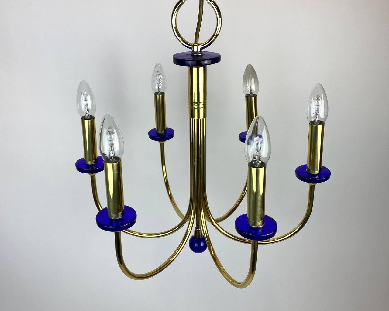 Vintage chandelier from Famous German Manufacture - Asmuth Leuchten.

This chandelier made of Cobalt Glass and Gilding.

1970’s.

Vintage.

For 6 lamps E-14.

Exellent condition.

Size:

Height - 31.1 in 79 cm.

Diameter - 18.9 in 48