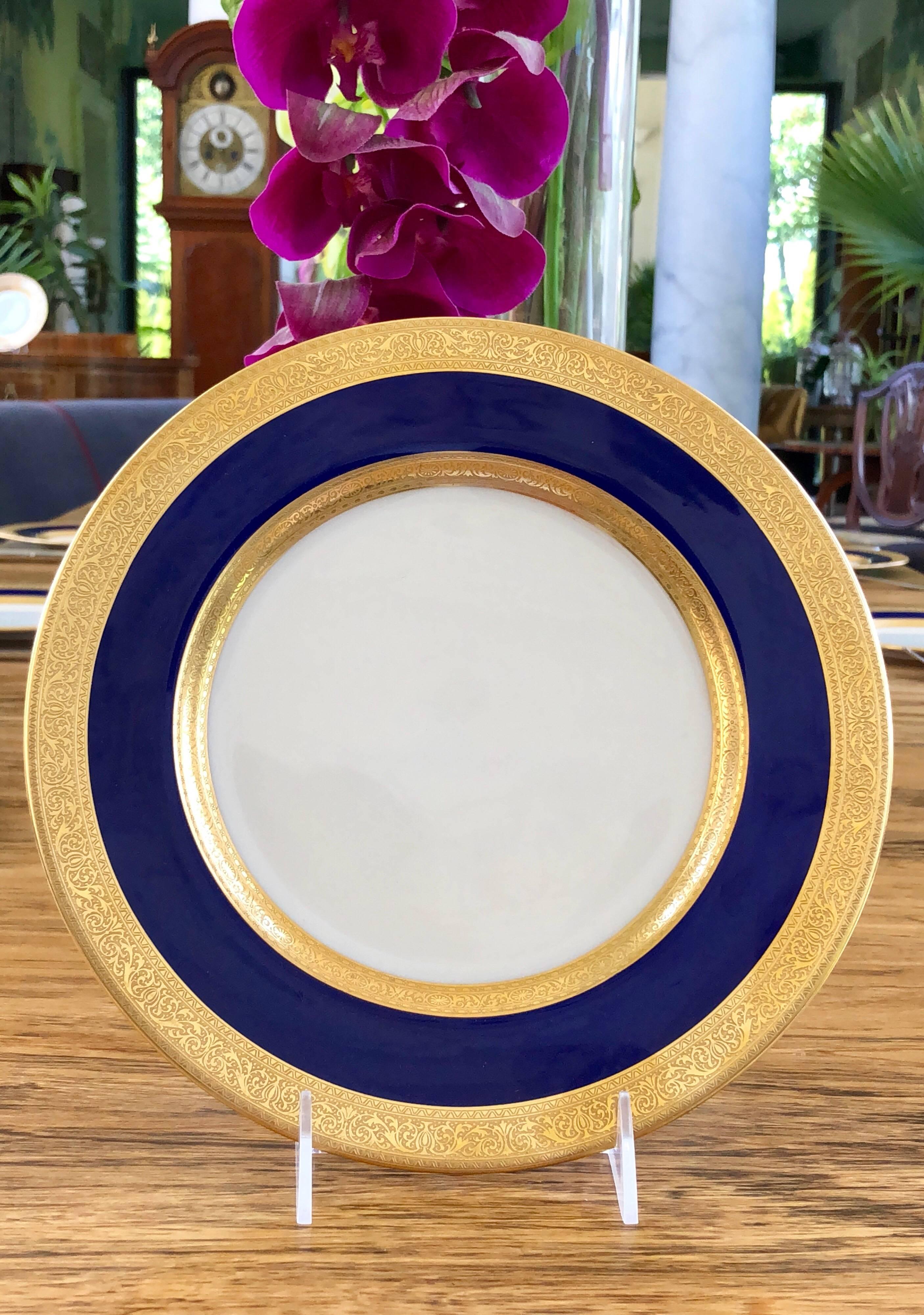 This elegant set of 10 Lenox dinner plates has a cobalt blue border with a 24-karat gold rim.
Made by Lenox and retailed by Marshall Field & Company in Chicago.
Made in the US, circa 1910 it is in remarkable good condition.
 