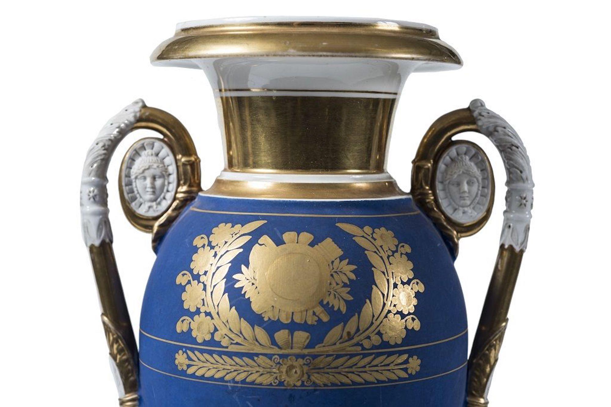 These cobalt porcelain vases are original decorative objects realized in France in the 19th century, during the imperial period.

This refined couple of vases is realized in gold and cobalt blue.

Very good conditions.

The imperial style is