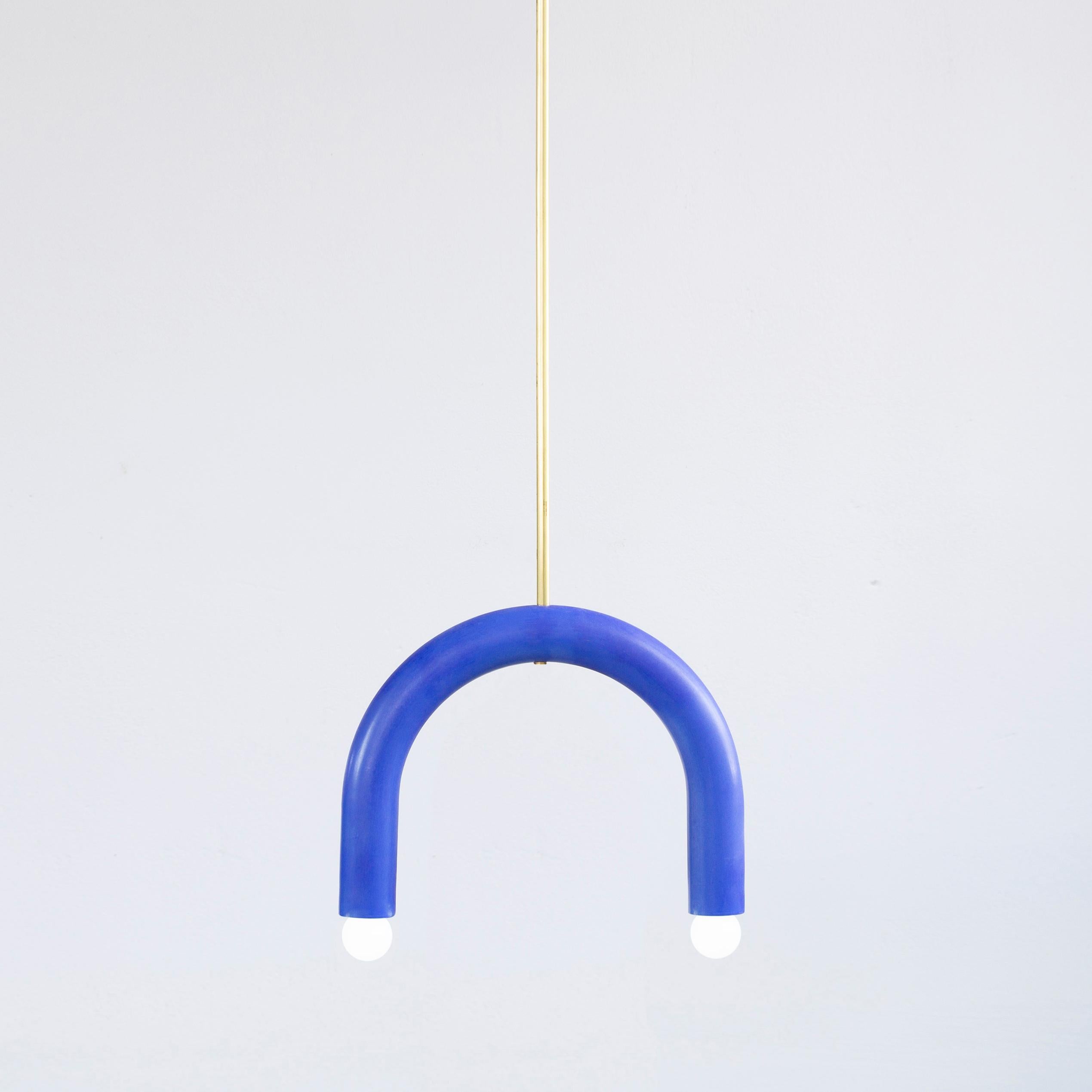 Cobalt TRN B1 pendant lamp by Pani Jurek
Dimensions: D 5 x W 35 x H 28 cm 
Material: Hand glazed ceramic and brass.
Available in other colors.
Lamps from the TRN collection hang on a metal tube, not on a cable. This allows the lamp to be mounted in