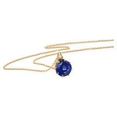 Cober “African dream”with 15.56 ct. Tanzanite and 2 Diamonds YellowGold Pendant 