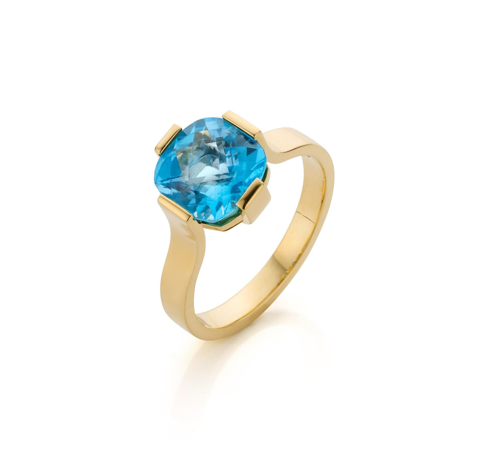 For Sale:  Cober “Blue Topaz Solitaire” set with a 3.25 Carat Blue Topaz Yellow Gold Ring 5