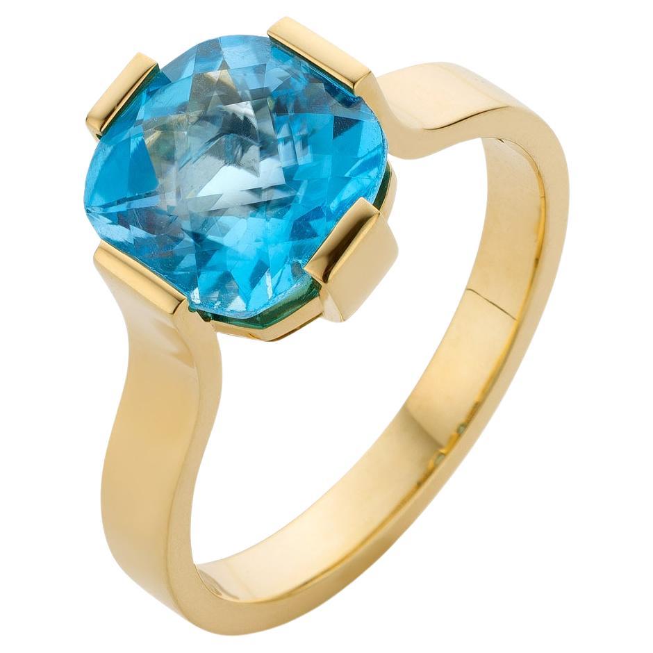 For Sale:  Cober “Blue Topaz Solitaire” set with a 3.25 Carat Blue Topaz Yellow Gold Ring