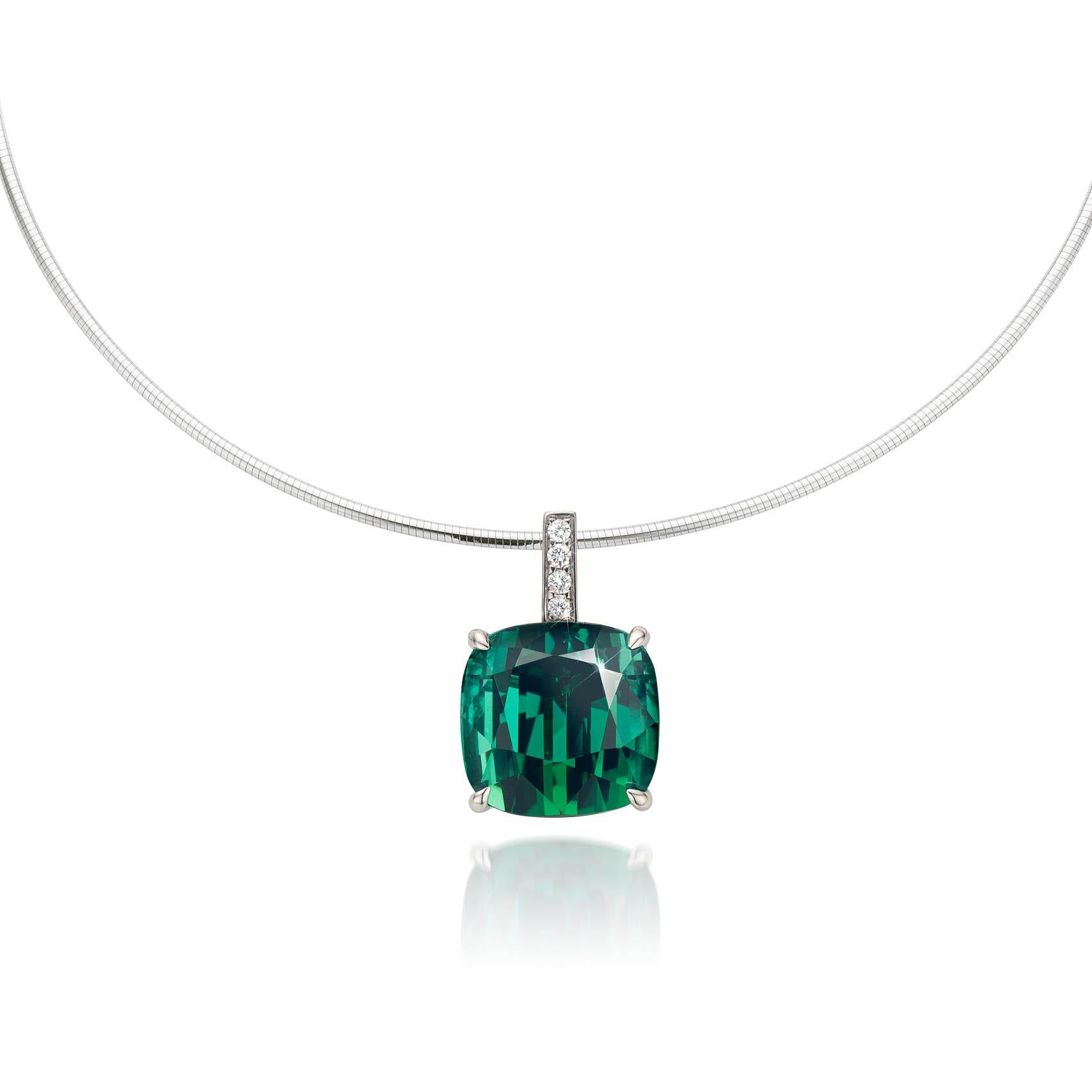 This is a 14 Carat white gold pendant with a 9,40 ct. vivid clean green Tourmaline. Above the Tourmaline are 4 x 0,01 ct. Brilliant-cut Diamonds. A very dedicated item for special occasions. Please note, that the necklace is not included.
Cober