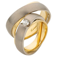Cober “Crossover Bomb” 0.18 Ct Diamond White and Yellow Gold Wedding Rings