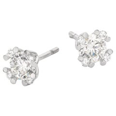Cober “Dancing with the stars white” with a central 0.50 Carat Diamond Ear studs