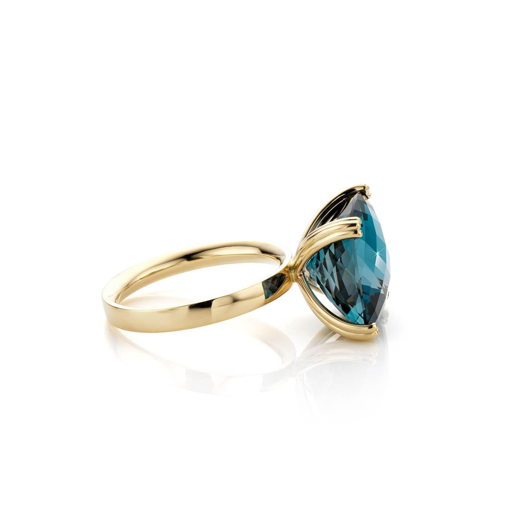 This is a 14 Carat yellow gold ring with a very beautiful “London blue” Topaz, in a cushion-cut. This ring is now available. Cober designs exclusive wedding rings, jewels and watches, all of them made by hand.
“The most distinctive jewellery