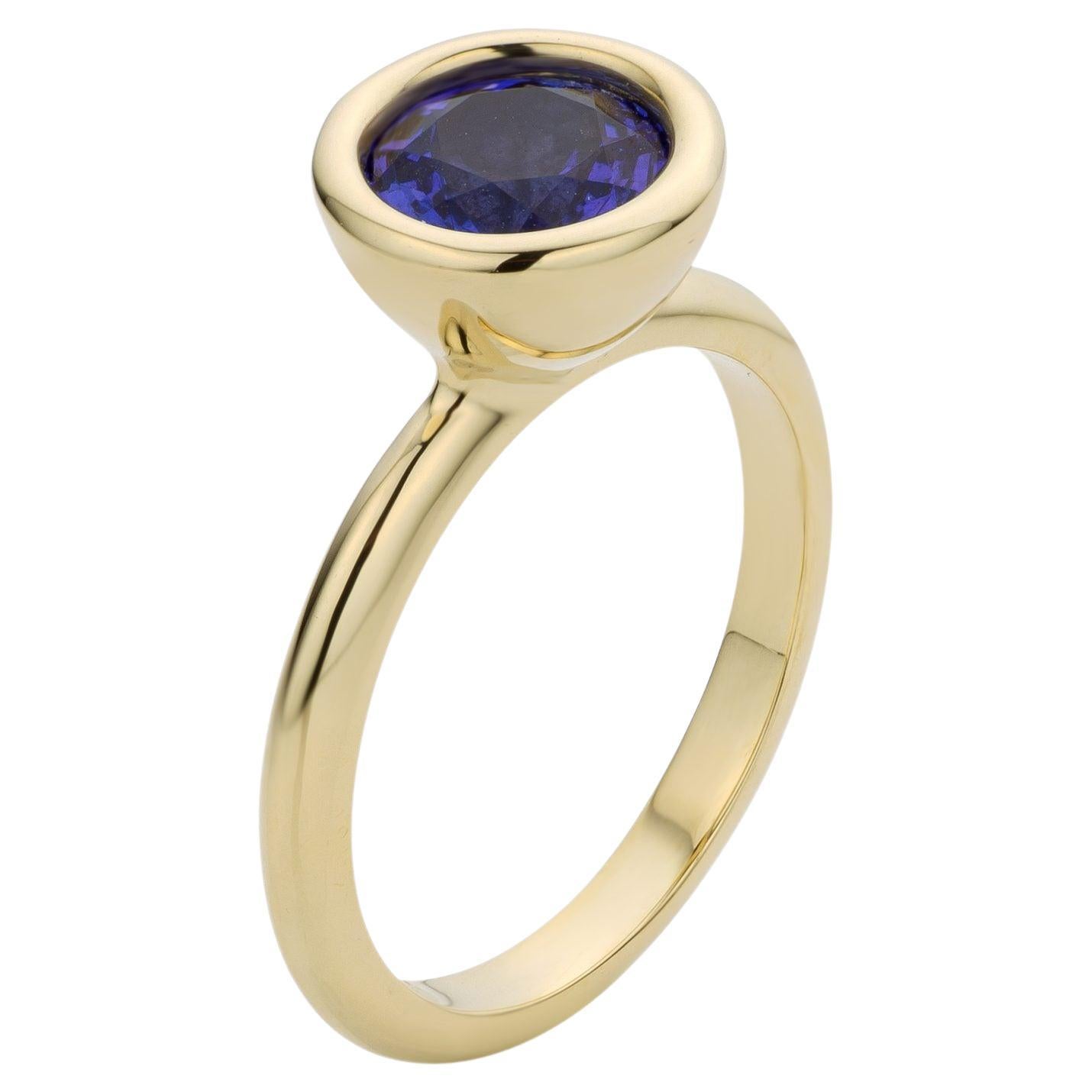 Cober multiple rings often worn together with 1.85 Carat Tanzanite Stacking Ring