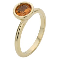 Cober multiple rings often worn together with light orange Sapphire Ring