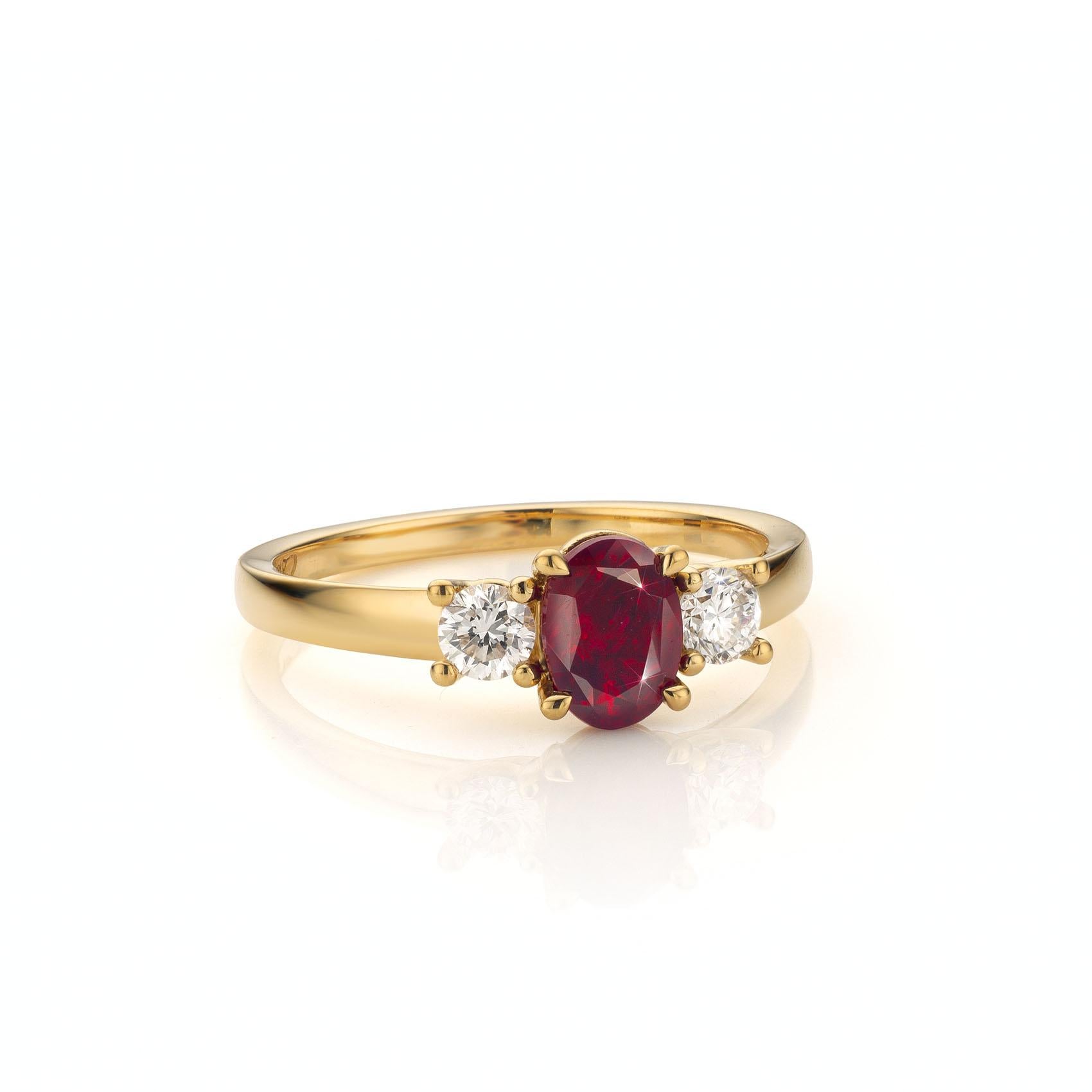 Contemporary Cober with a Ruby of 1.12 Carat and two diamonds of 0.15 Carat Yellow Gold Ring For Sale
