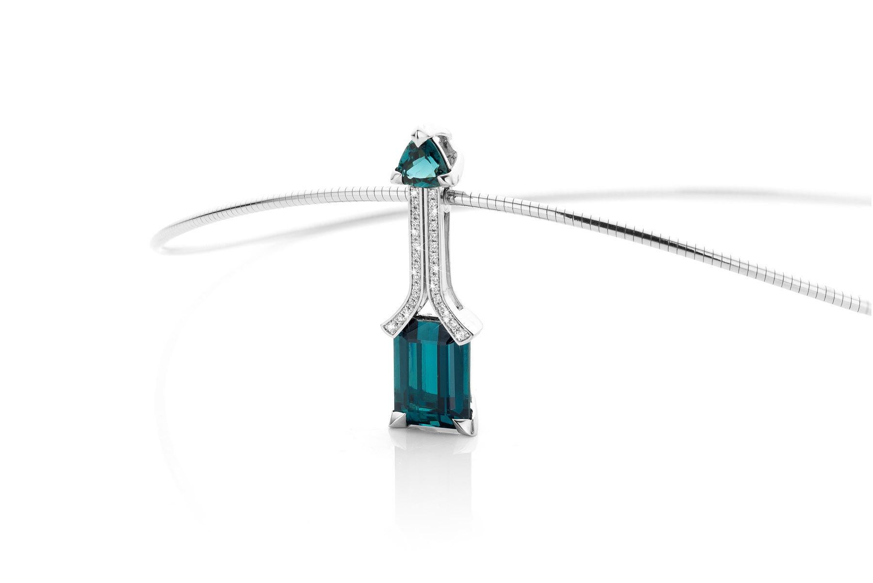 Cober Jewellery white gold pendant with Tourmalines and diamonds

This is a white gold 18K pendant with two Tourmalines and 30 Diamonds. The two Tourmalines weigh 7,04 ct. and 0,68 ct. The Diamonds have a total weight of 0,15 ct.
Please note, that