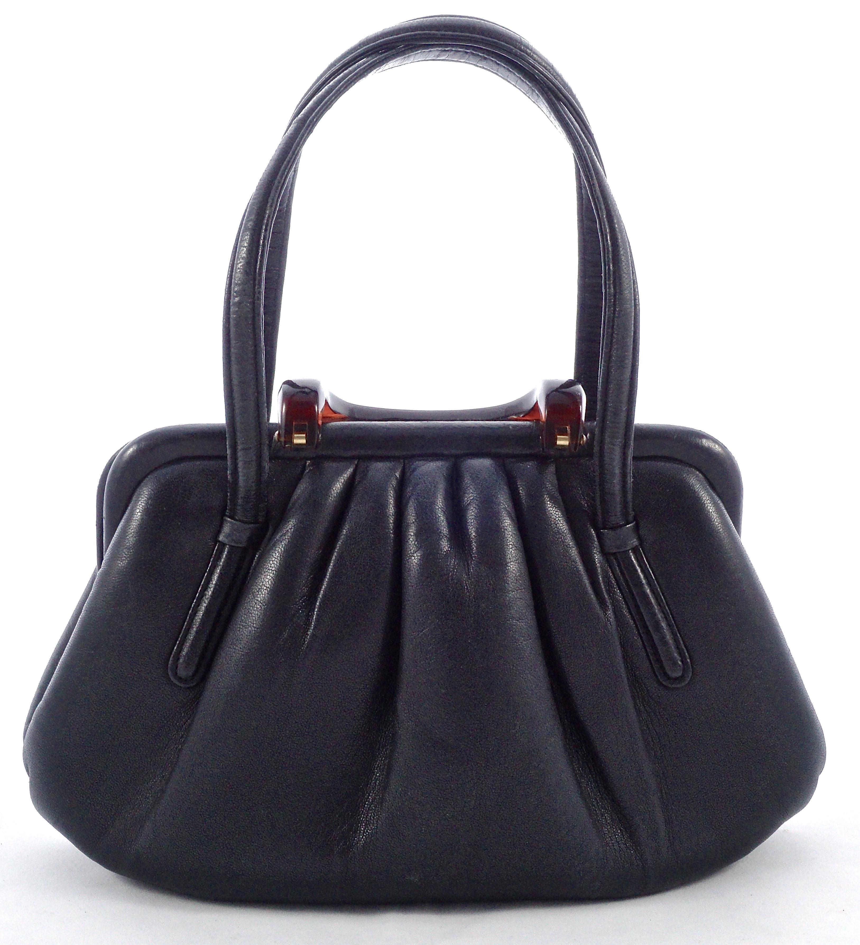 Beautiful Coblentz Italian soft black leather handbag with a faux tortoiseshell foldover clasp, and featuring five pleats to the front and back. Measuring 24.5cm / 9.64 inches at the base, height 15.5cm / 6.1 inches, and maximum depth approximately