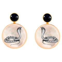 Boucles d'oreilles serpent cobra noir et blanc avec onyx et nacre