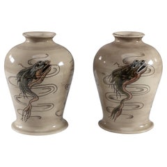 Cobridge Stoneware. signed by Eric Knowles. Two small fish vases