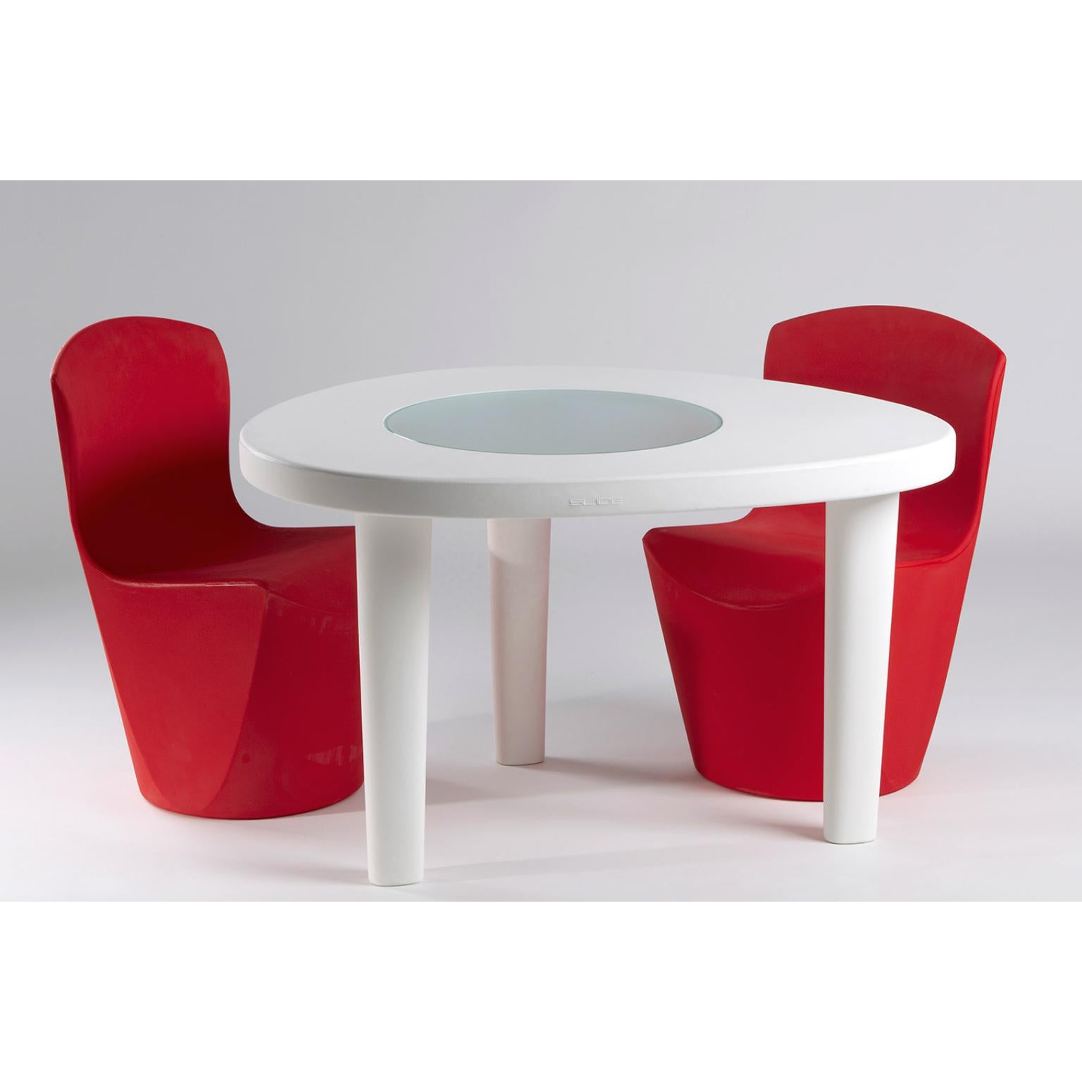 Coccodé Lime Green Table by Giò Colonna Romano
Dimensions: D 100 x W 120 x H 72 cm.
Materials: Polyethylene and tempered/satinated glass.
Weight: 20 kg.

Available in different color options. Prices may vary. This product is suitable for indoor and
