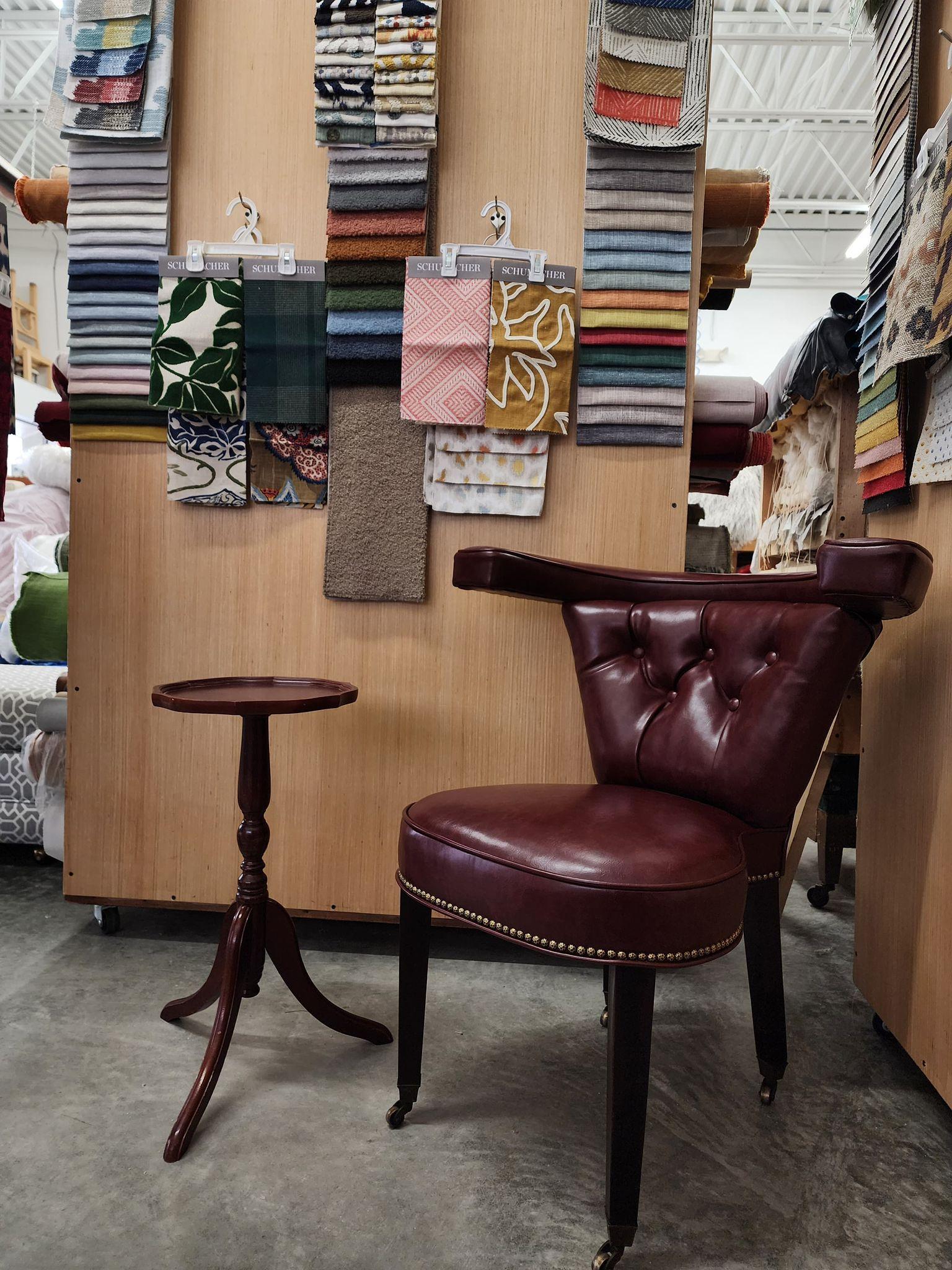 Cockfighting Desk Chair professionally reupholstered in vegan oxblood red vegan leather with Brass Oxford nail head trim. This chair can be added to an office to use as a desk, used as a corner chair or a chair for a home library. 

History on the