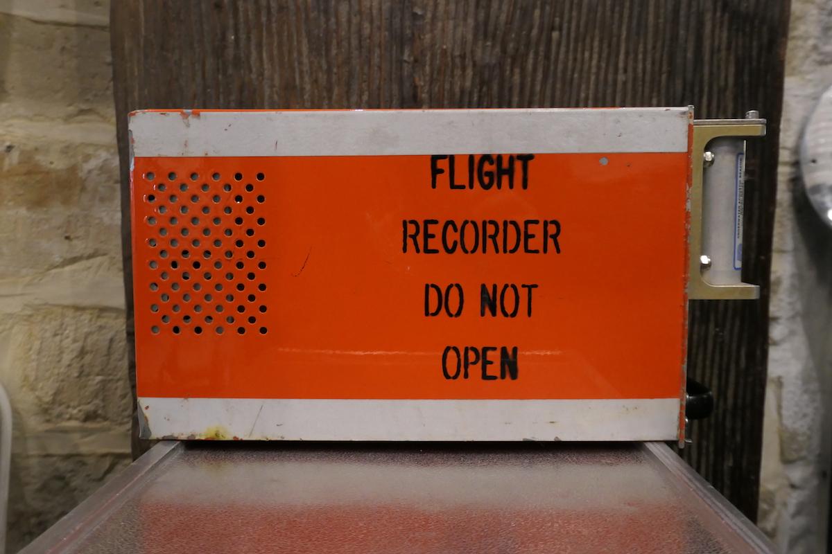 An authentic aircraft black box ''Cockpit voice recorder'' manufactured by Sundstrand Data Control, Inc. in Washington model V-557. With all stickers and indications of origin and control. In good condition. It is a typically recognizable