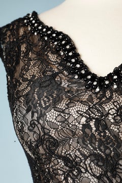 Abito da cocktail in pizzo nero con perline e fodera in jersey oro Roberto Balestra