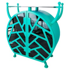Cocktail Bug Buffet: Turquoise Postmodern Liquor Cabinet with Playful Design