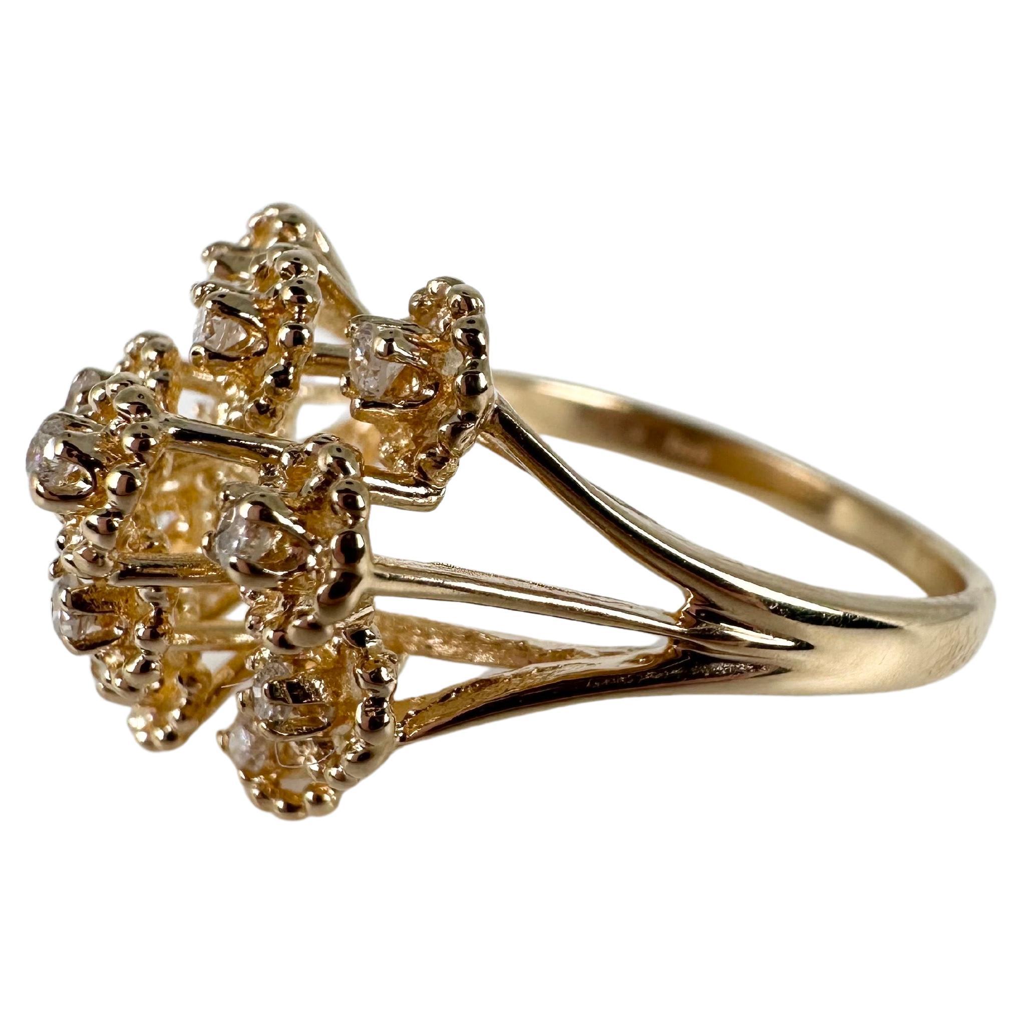 A custom ring made in sno falling design idea. The diamonds are resembling snow falling from the sky. The ring is made in 14KT yellow gold with beautiful white natural diamonds. The ring is a large cocktail style ring in a dome like setting. 

GOLD:
