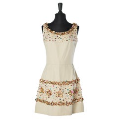 Cocktail dress in beige canevas with beaded work and flowers embroideries 